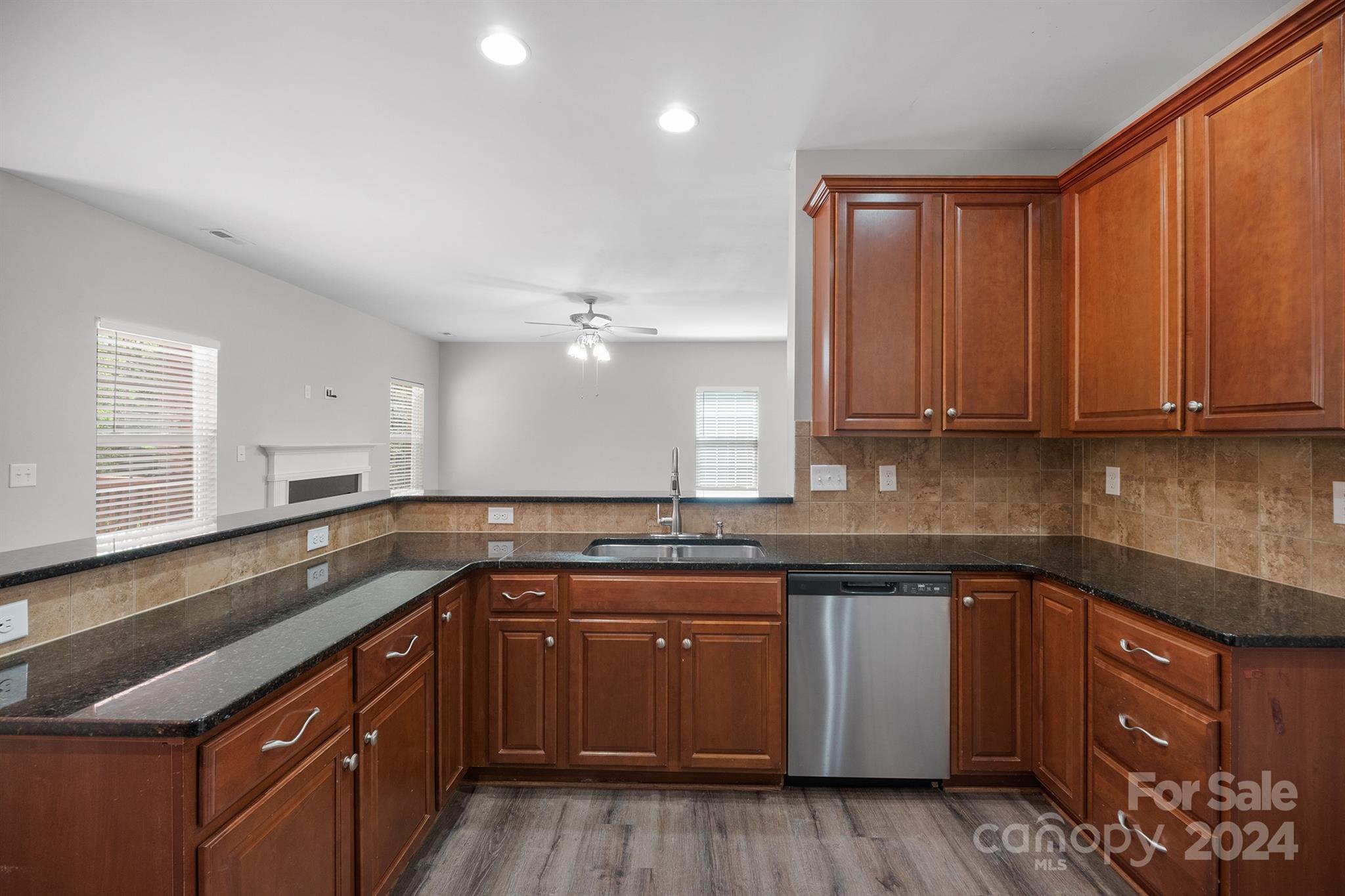 4009 Thorndale Road Indian Trail, NC 28079 - Photo 5 of 48 a kitchen with a sink and cabinets