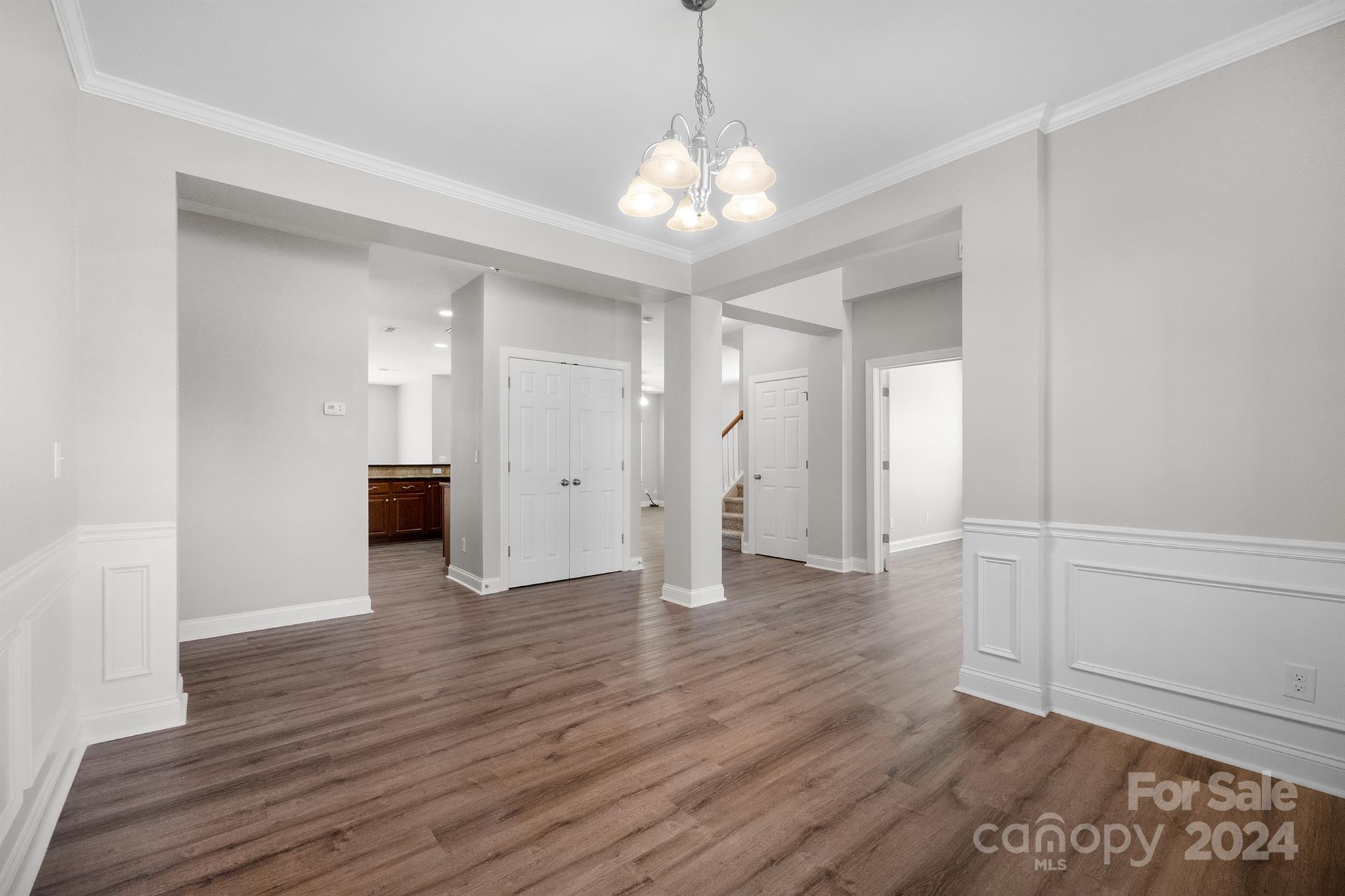 4009 Thorndale Road Indian Trail, NC 28079 - Photo 10 of 48 a view of an empty room with wooden floor and a window