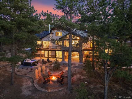 a kitchen with stainless steel appliances a sink stove and cabinets