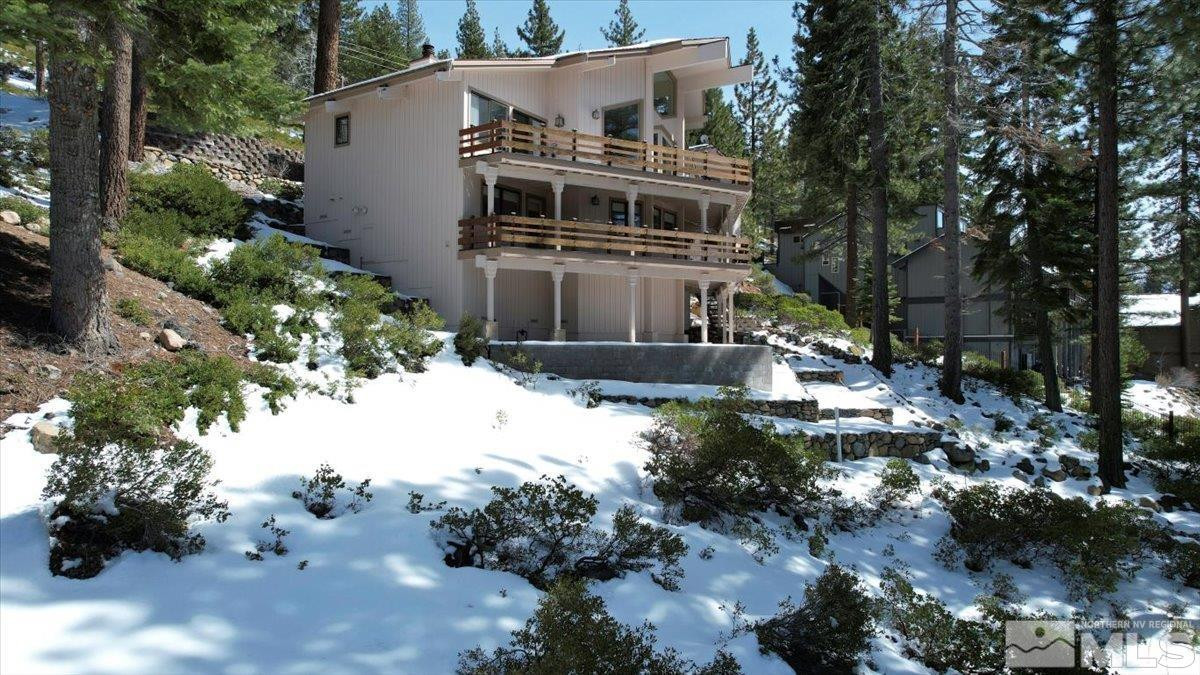 449 Fairview Boulevard Incline Village, NV 89451 - Photo 20 of 40 a view of a house with a yard covered with trees