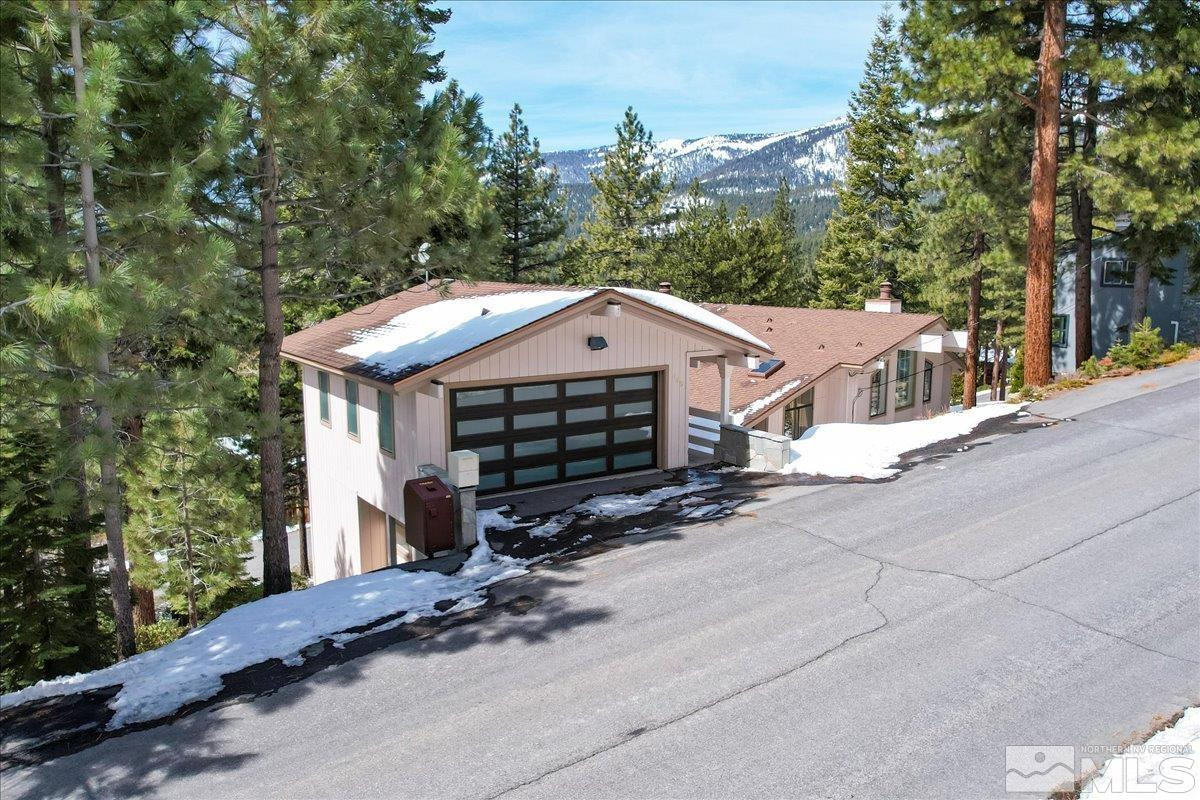 449 Fairview Boulevard Incline Village, NV 89451 - Photo 2 of 40 a view of a house with a yard