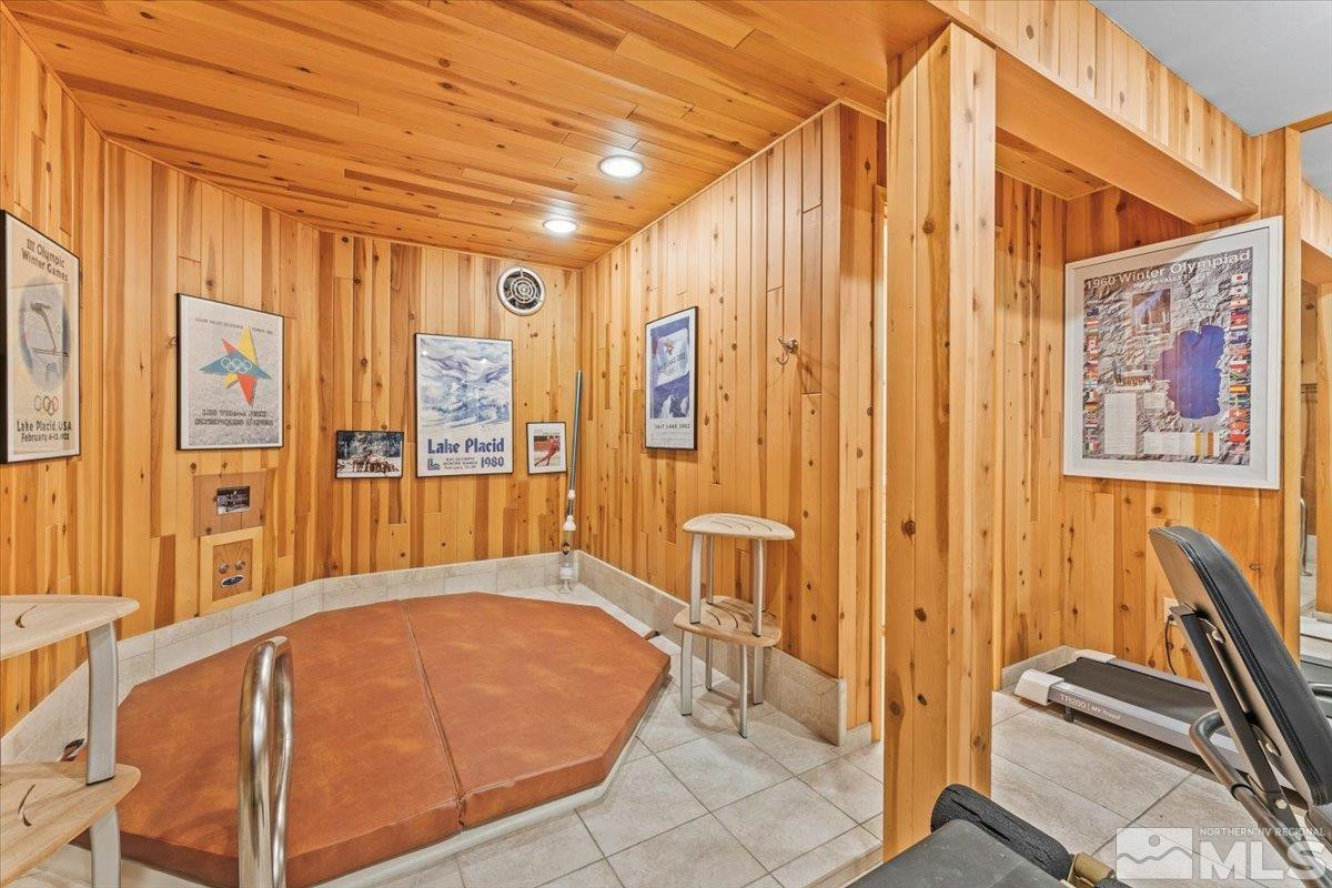 449 Fairview Boulevard Incline Village, NV 89451 - Photo 21 of 40 a view of a bedroom with furniture and windows