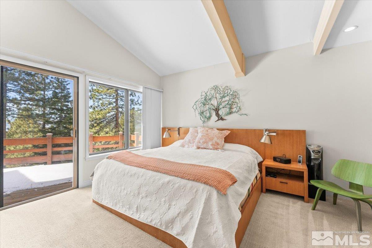 449 Fairview Boulevard Incline Village, NV 89451 - Photo 36 of 40 a bedroom with a bed and a large window