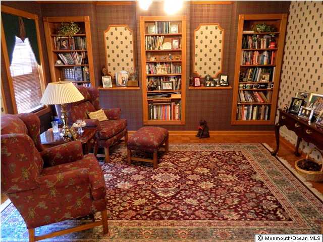 9 Rizzo Court Howell, NJ 07731 - Photo 6 of 23 a living room with furniture and a floor to ceiling window