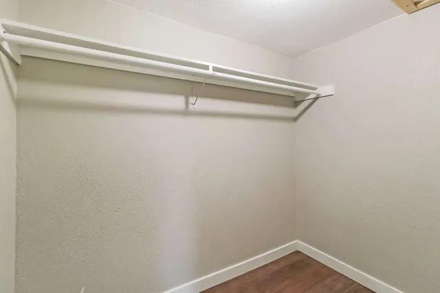 a view of a room with racks on the wall