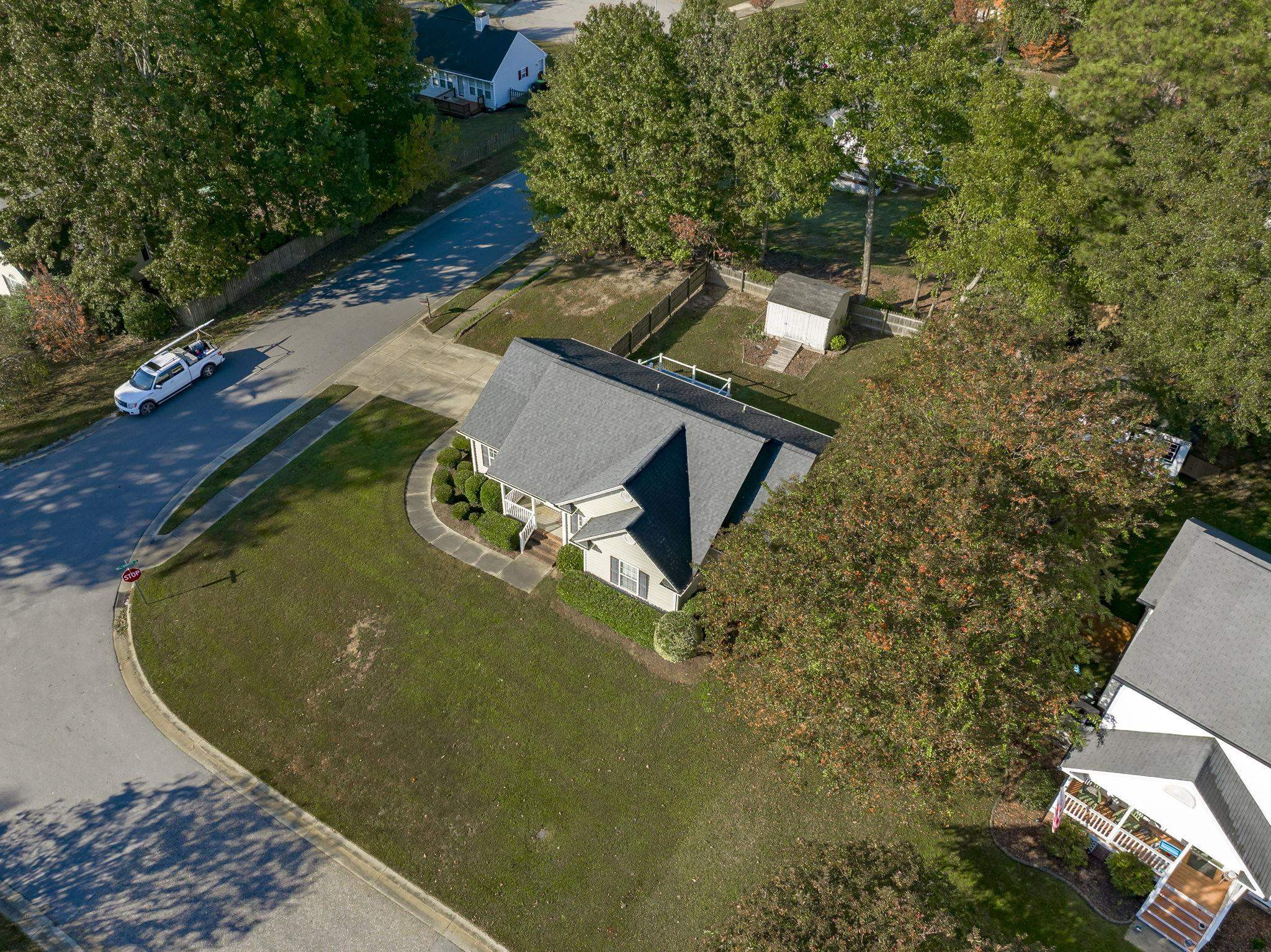 200 Peakhill Road Holly Springs, NC 27540 - Photo 16 of 18 an aerial view of a house with a yard