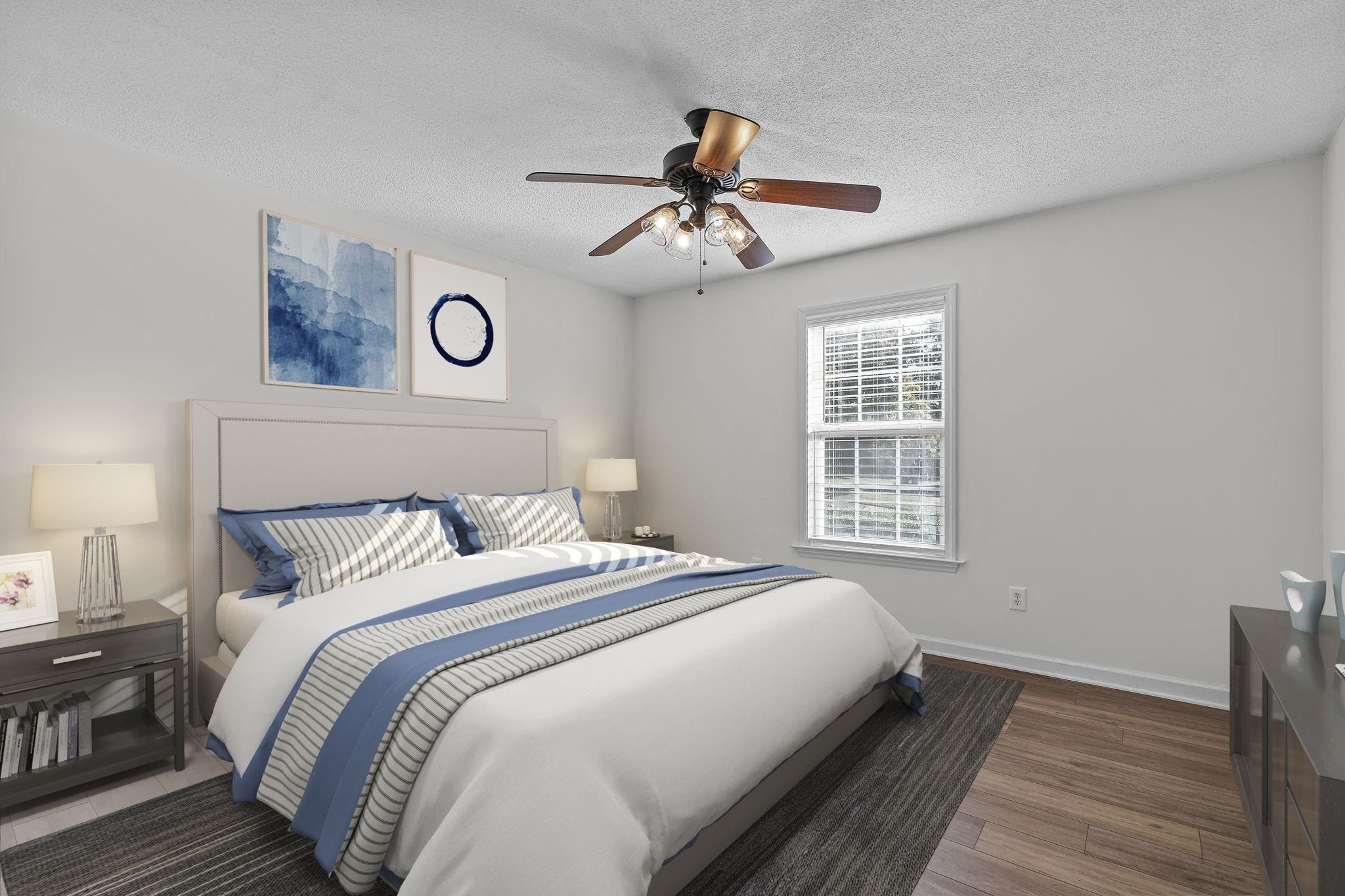 200 Peakhill Road Holly Springs, NC 27540 - Photo 7 of 18 a bedroom with a bed and a window