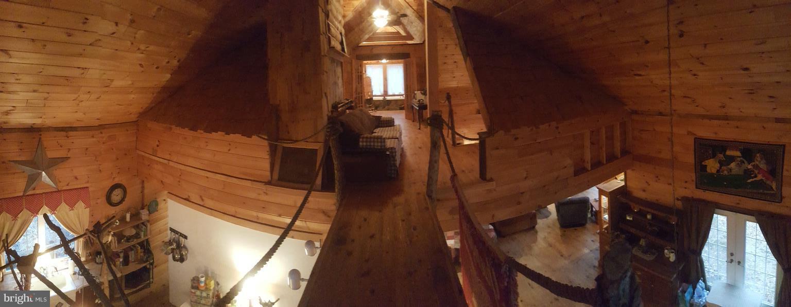 894 Fulton Road Hedgesville, WV 25427 - Photo 11 of 28 catwalk view from sitting area into master bath