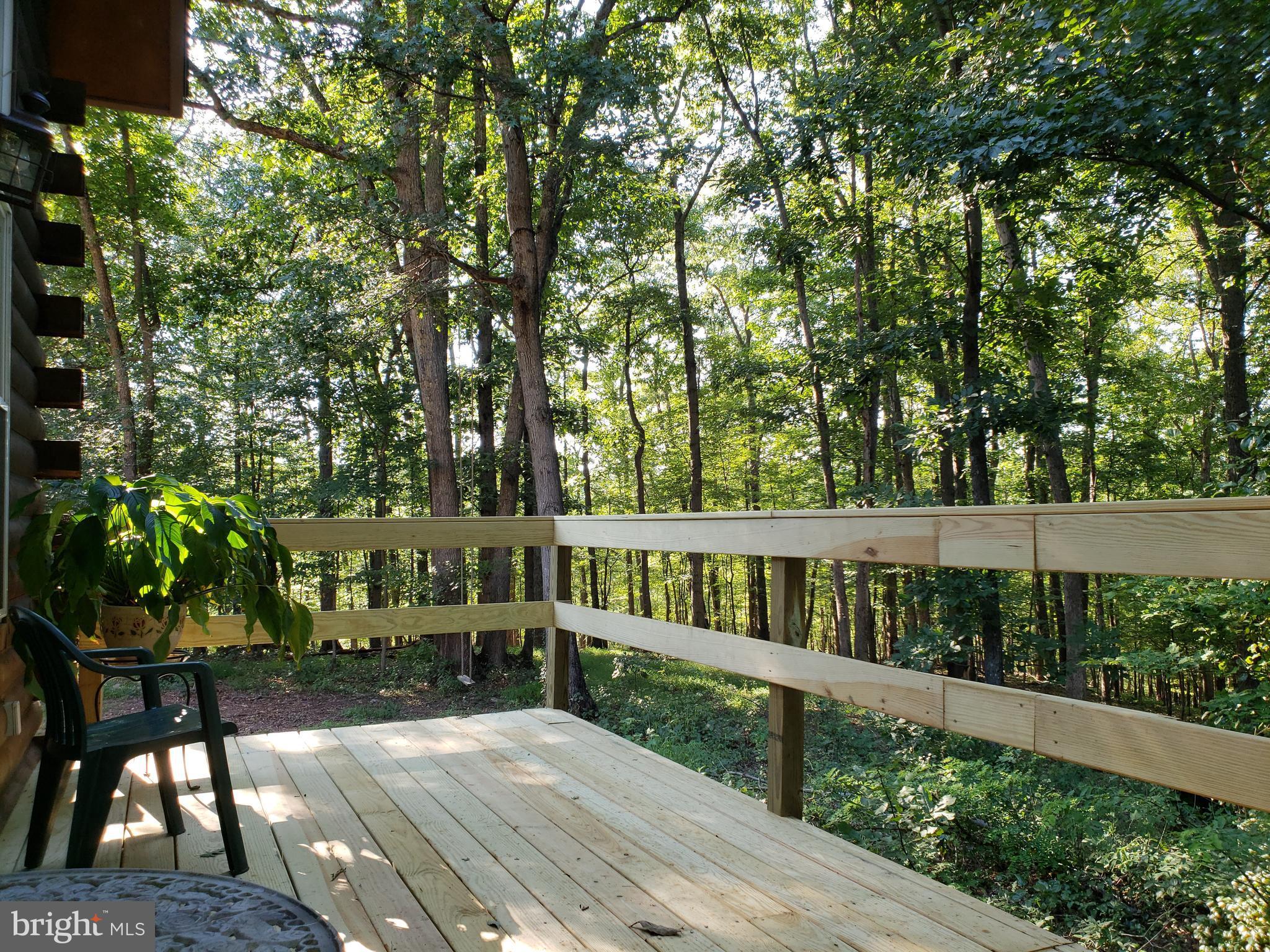 894 Fulton Road Hedgesville, WV 25427 - Photo 3 of 28 come sit on rear deck and enjoy nature at its best