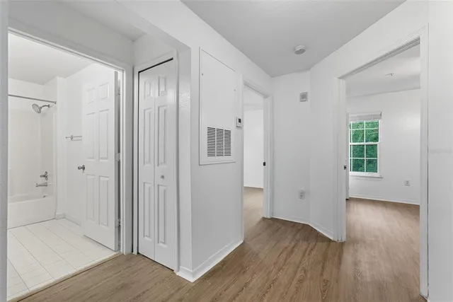 a view of entryway with wooden floor