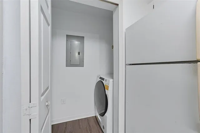 a bathroom with a shower and a mirror