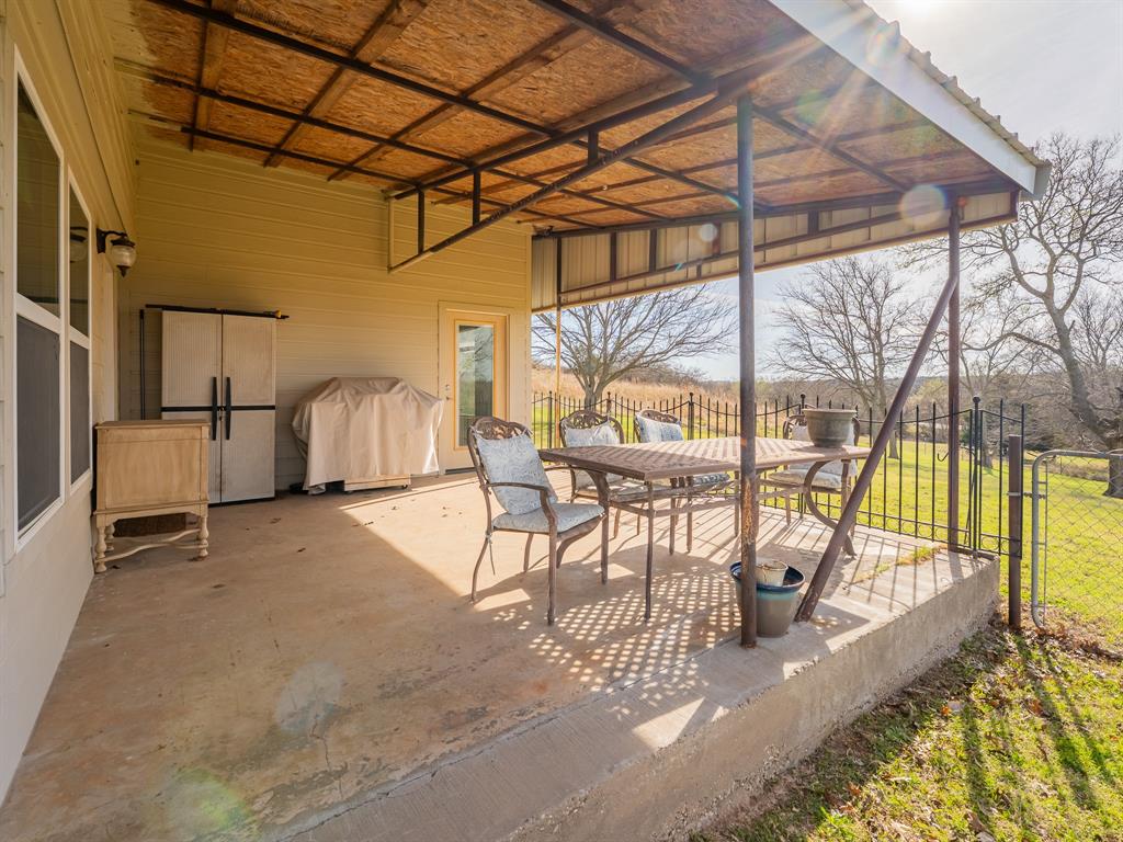 1857 Old Bonita Road Nocona, TX 76255 - Photo 20 of 39 a view of a porch with furniture