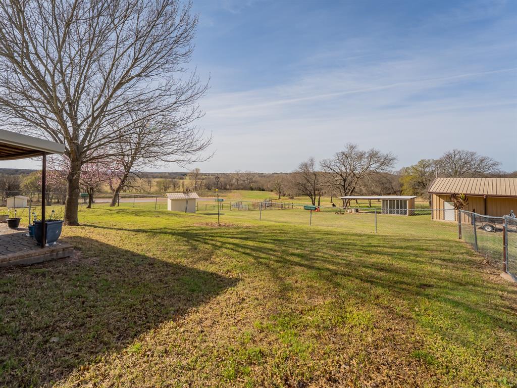 1857 Old Bonita Road Nocona, TX 76255 - Photo 21 of 39 a view of a swimming pool with an ocean view