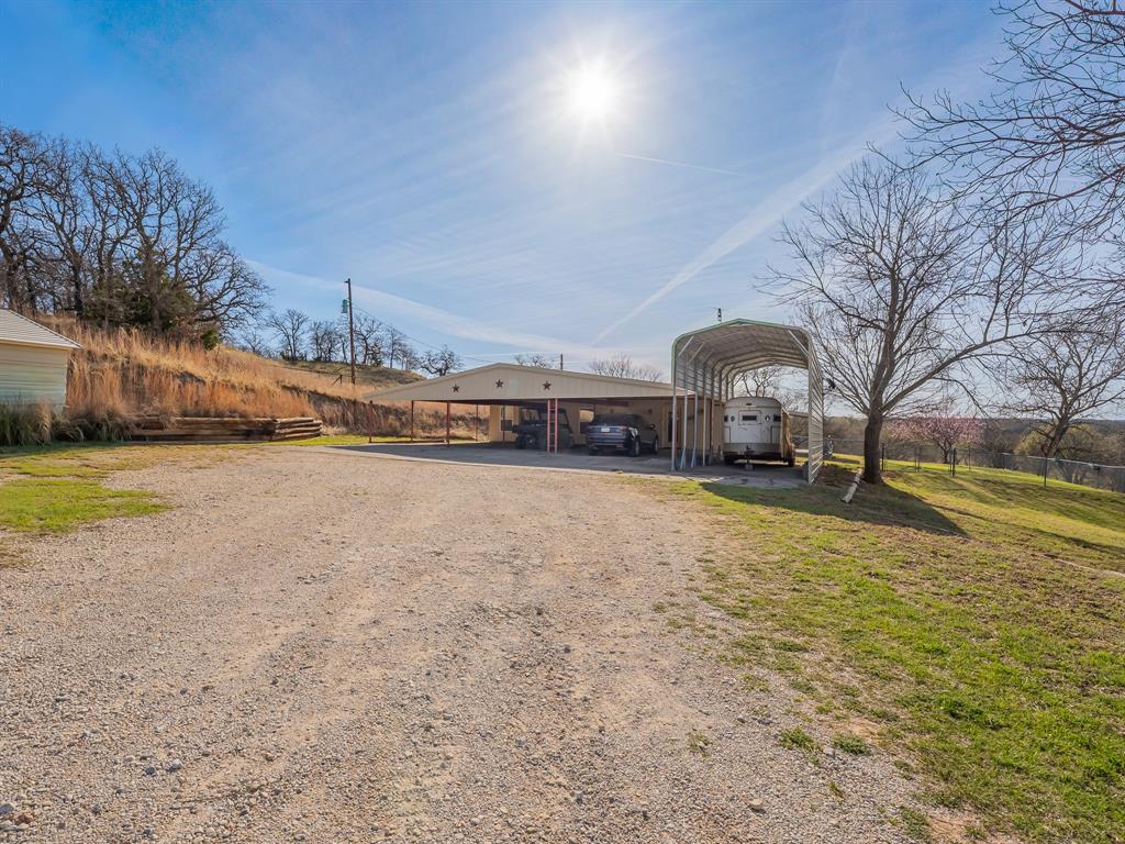 1857 Old Bonita Road Nocona, TX 76255 - Photo 39 of 39 a view of a house with a yard
