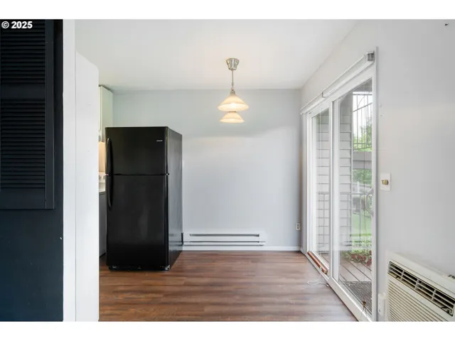 a view of a bathroom with a sink and mirror