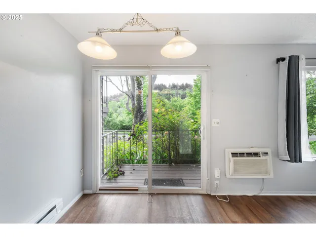 a kitchen with a sink a stove a refrigerator and cabinets