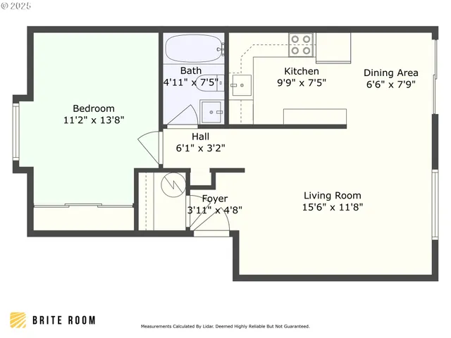 a view of a backyard with wooden fence
