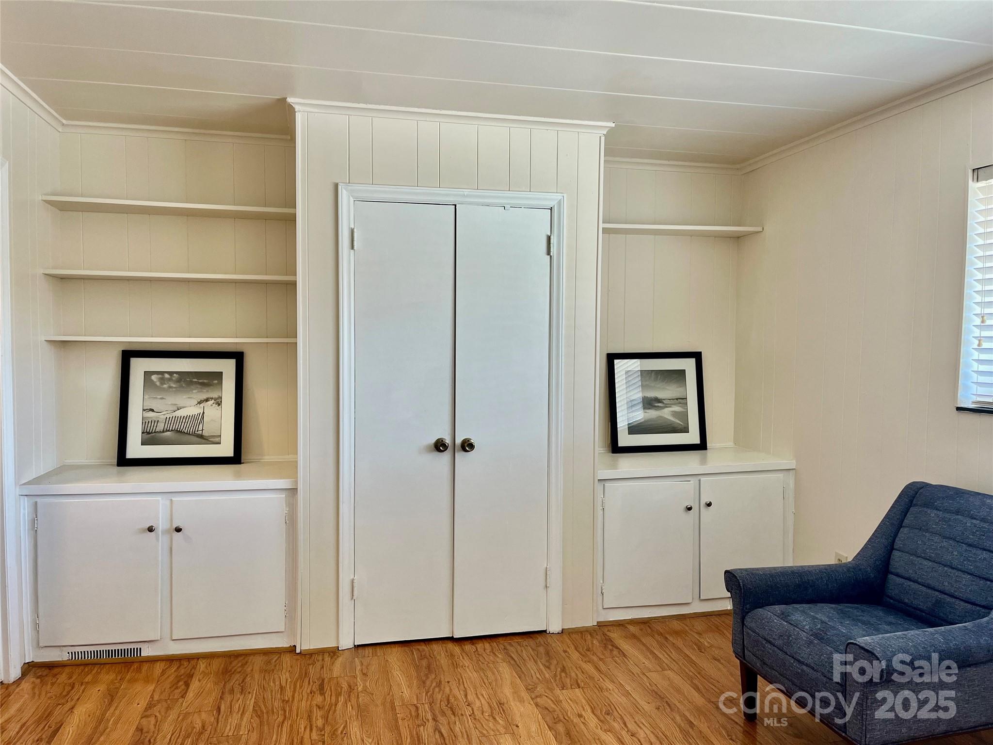 3010 Crosby Road, Unit 122 Charlotte, NC 28211 - Photo 21 of 38 a living room with furniture and a wooden floor