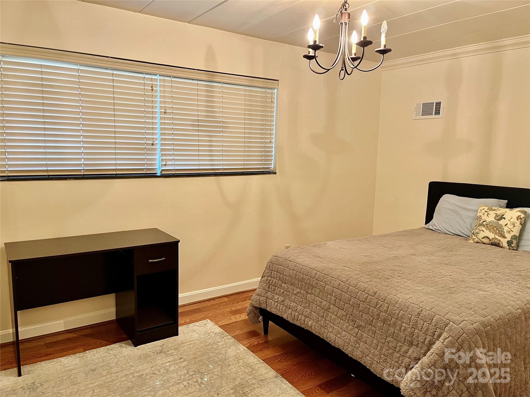 3010 Crosby Road, Unit 122 Charlotte, NC 28211 - Photo 27 of 38 a bedroom with a bed and a window