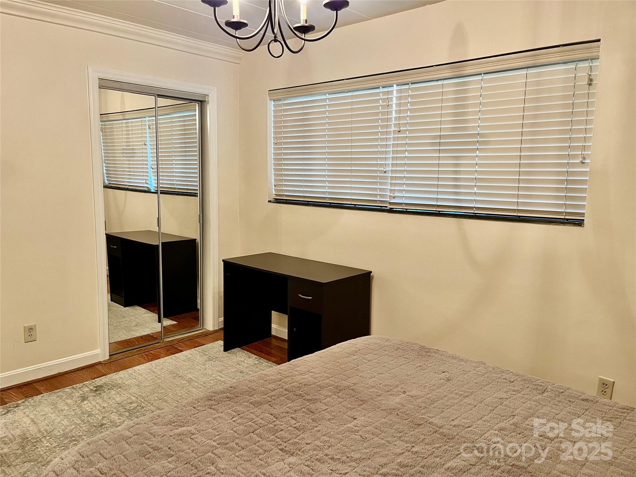 3010 Crosby Road, Unit 122 Charlotte, NC 28211 - Photo 28 of 38 a bedroom with a bed and a window