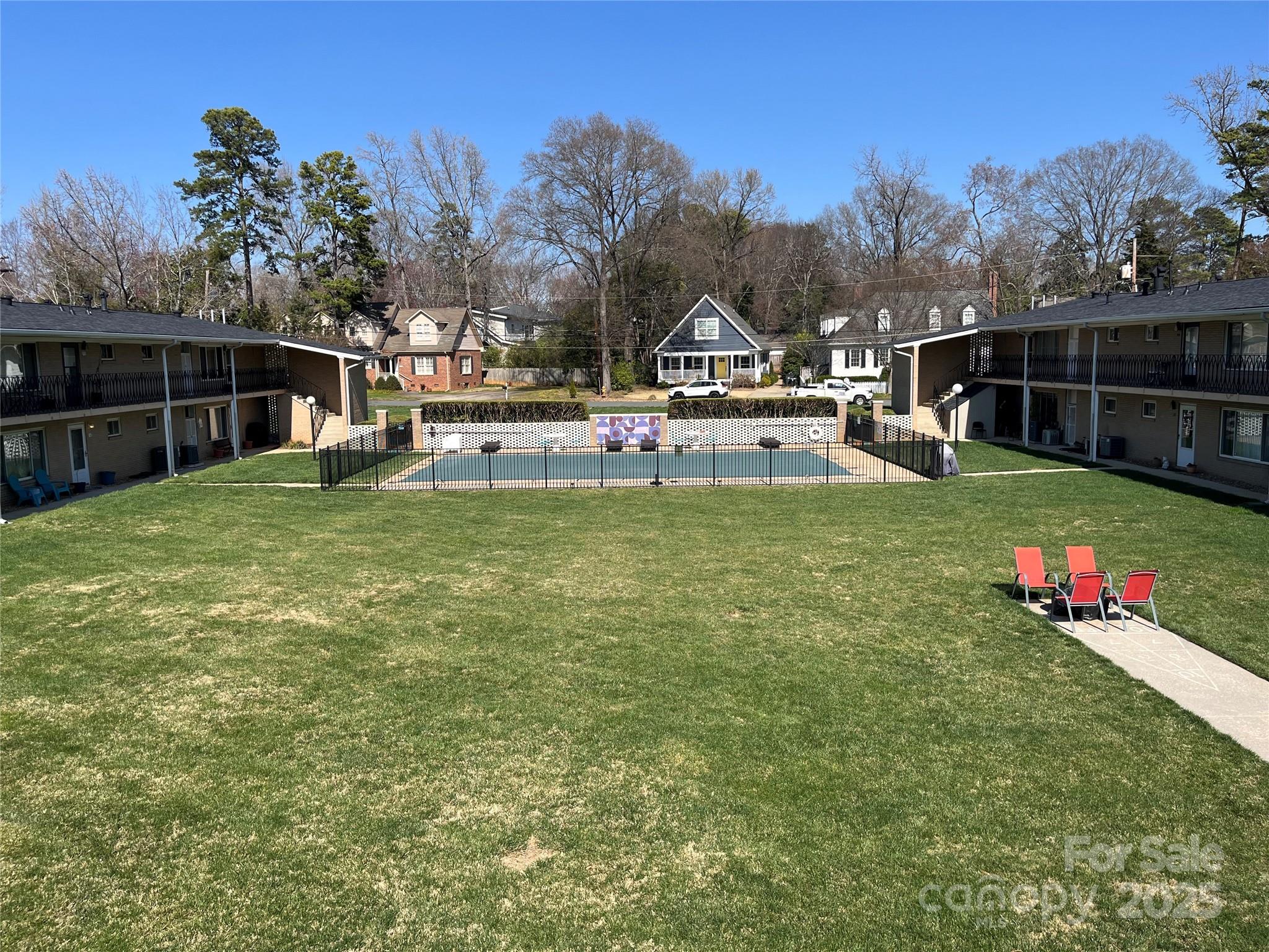 3010 Crosby Road, Unit 122 Charlotte, NC 28211 - Photo 37 of 38 a view of a house with swimming pool having outdoor seating