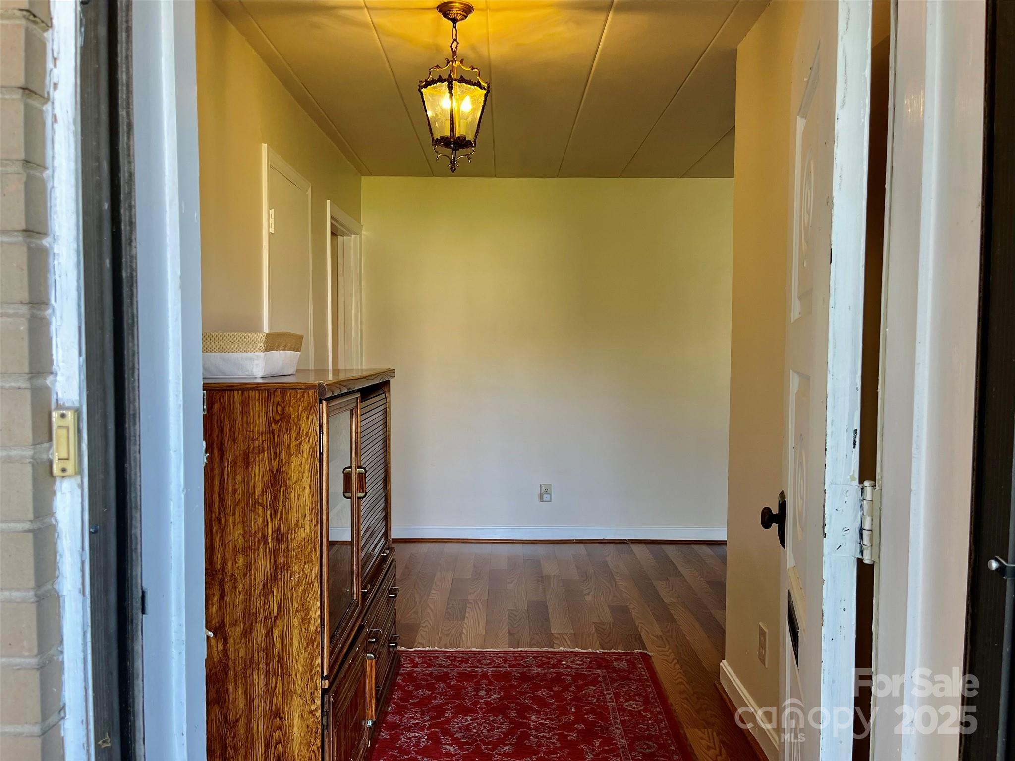 3010 Crosby Road, Unit 122 Charlotte, NC 28211 - Photo 5 of 38 a view of hallway with wooden floor