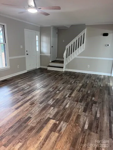 a view of entryway with wooden floor