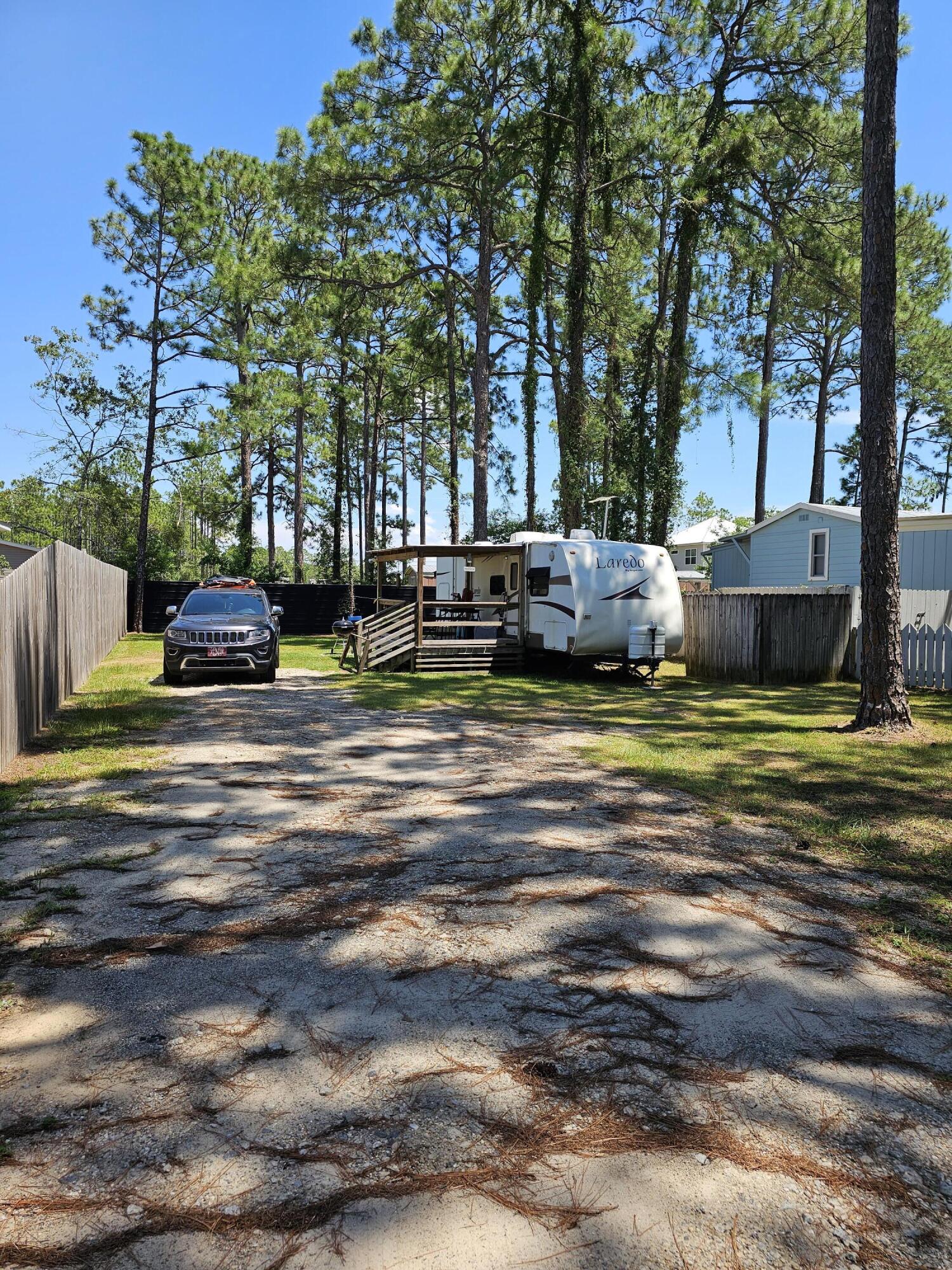 Tbd Tbd 1st St Point Santa Rosa Beach, FL 32459 - Photo 3 of 8 a view of a house with a big yard