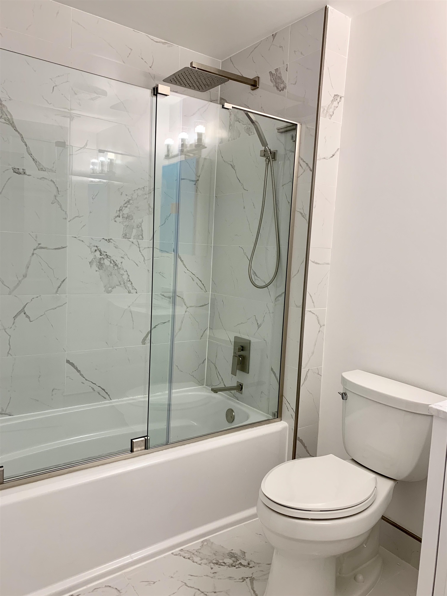 22 Bergen Ridge Road, Unit 2 North Bergen, NJ 07047 - Photo 11 of 15 a bathroom with a toilet and a shower