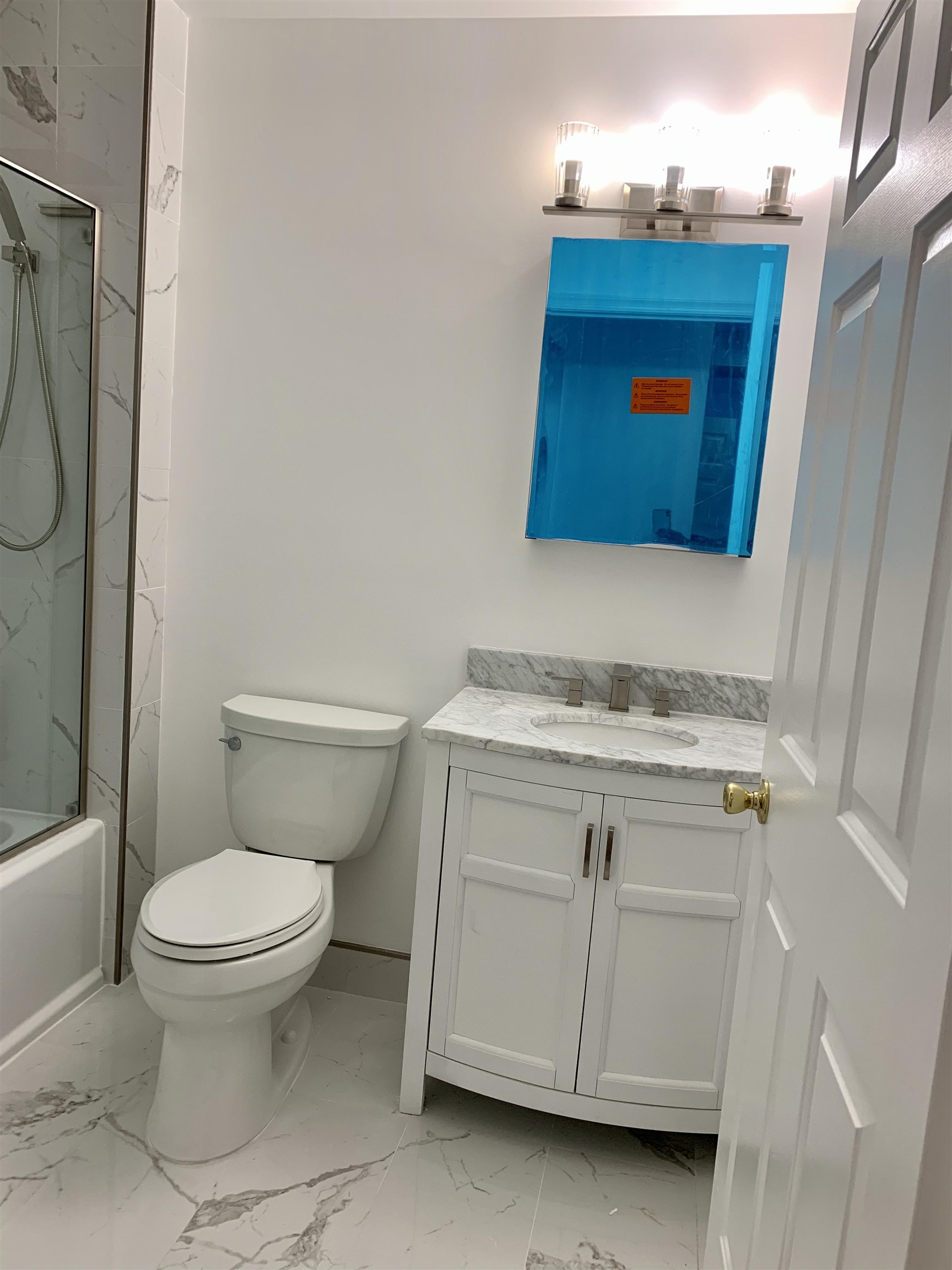 22 Bergen Ridge Road, Unit 2 North Bergen, NJ 07047 - Photo 10 of 15 a bathroom with a toilet and a sink
