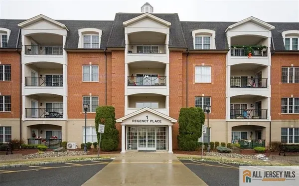 a front view of a building with a street