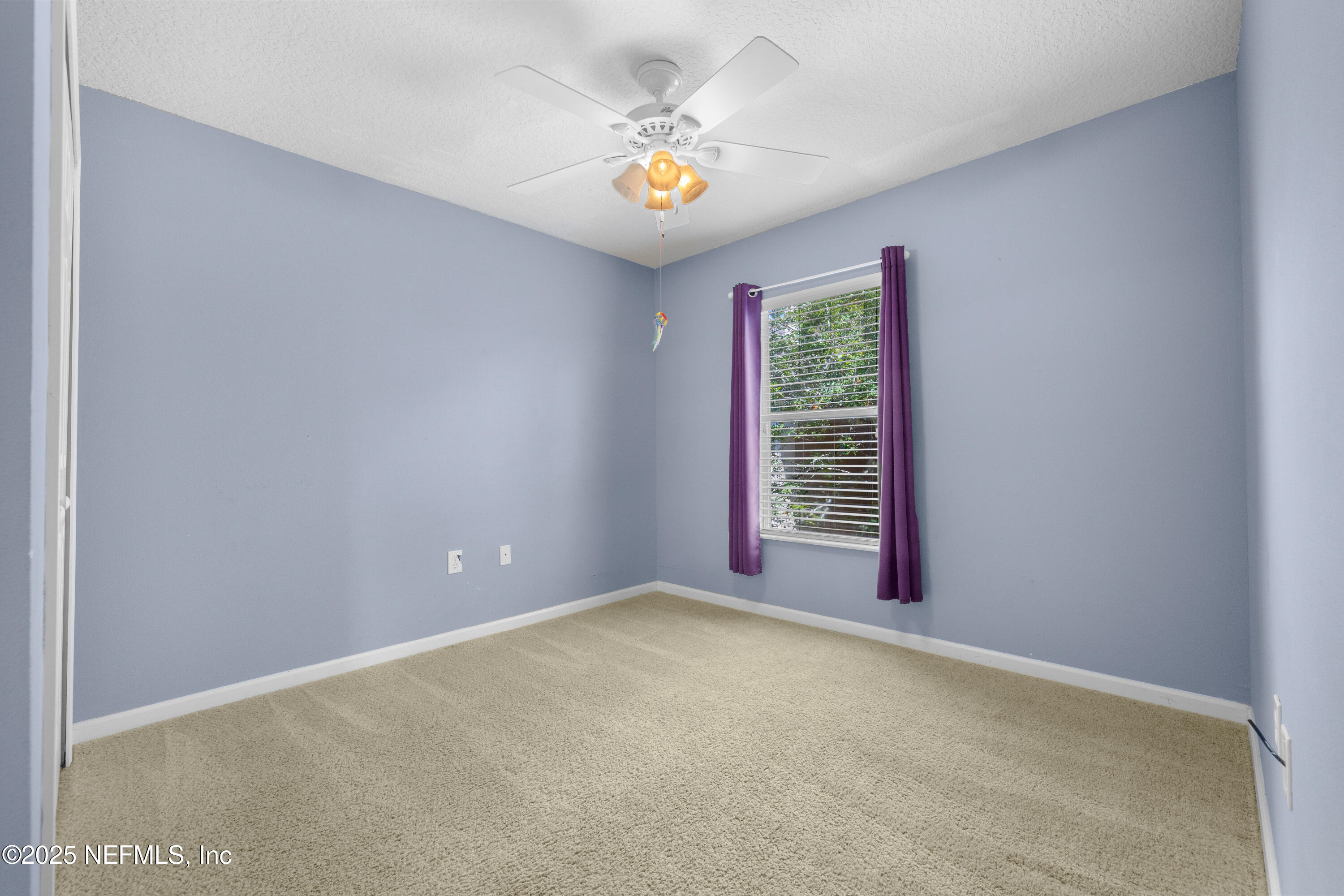 2784 Golden Lake Loop St. Augustine, FL 32084 - Photo 12 of 32 a view of an empty room with a window