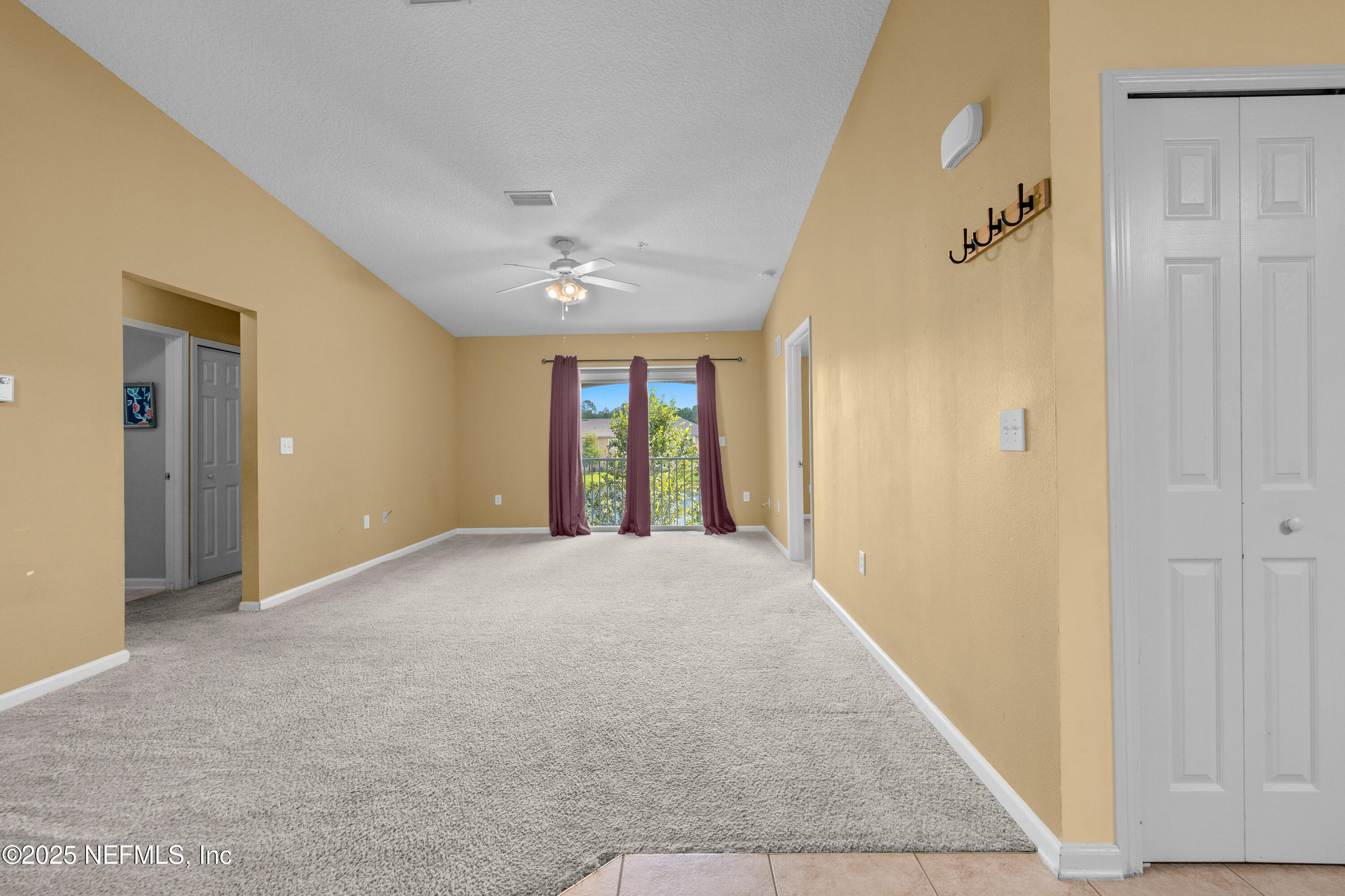 2784 Golden Lake Loop St. Augustine, FL 32084 - Photo 20 of 32 a view of an empty room with a window