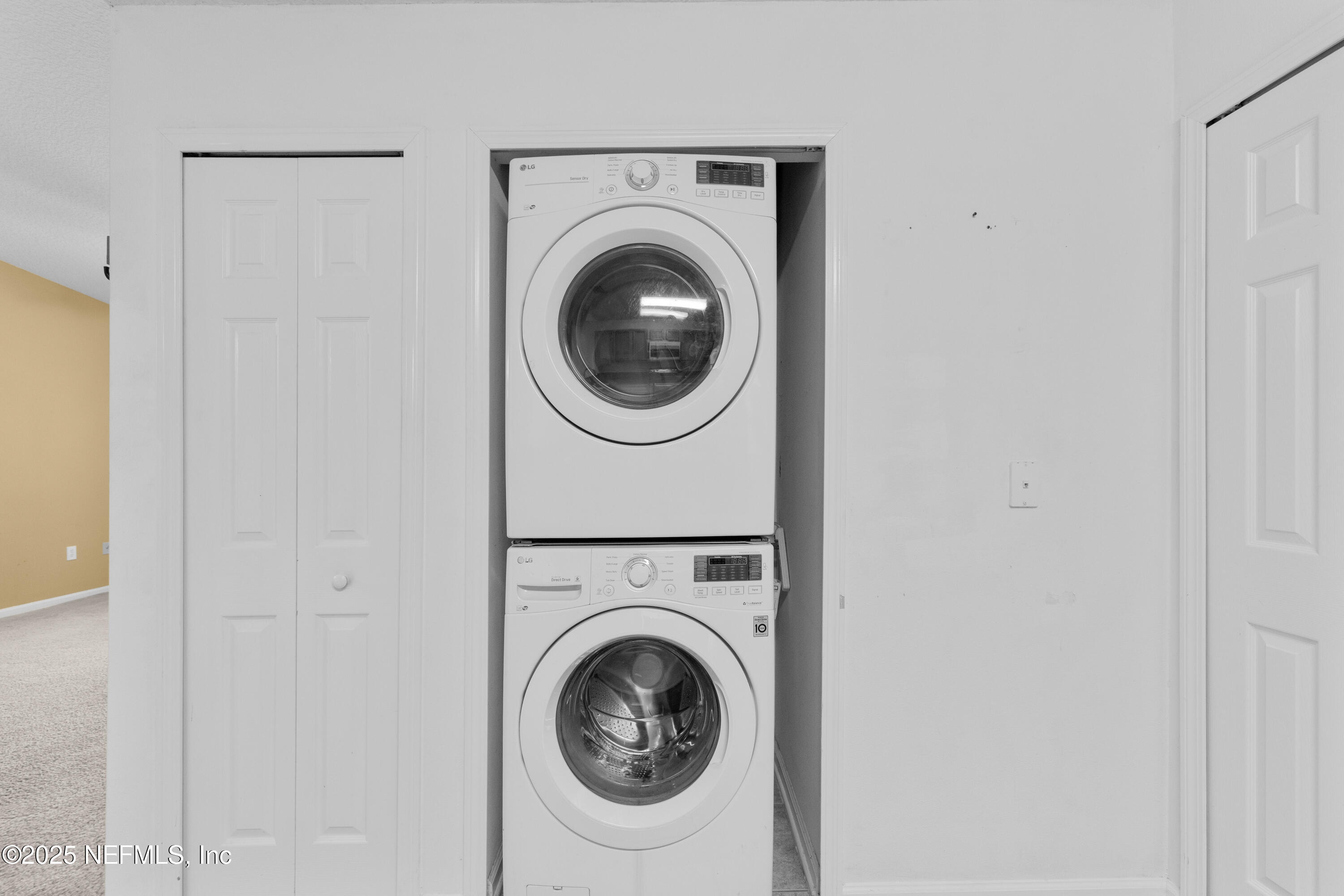2784 Golden Lake Loop St. Augustine, FL 32084 - Photo 23 of 32 a utility room with dryer and washer