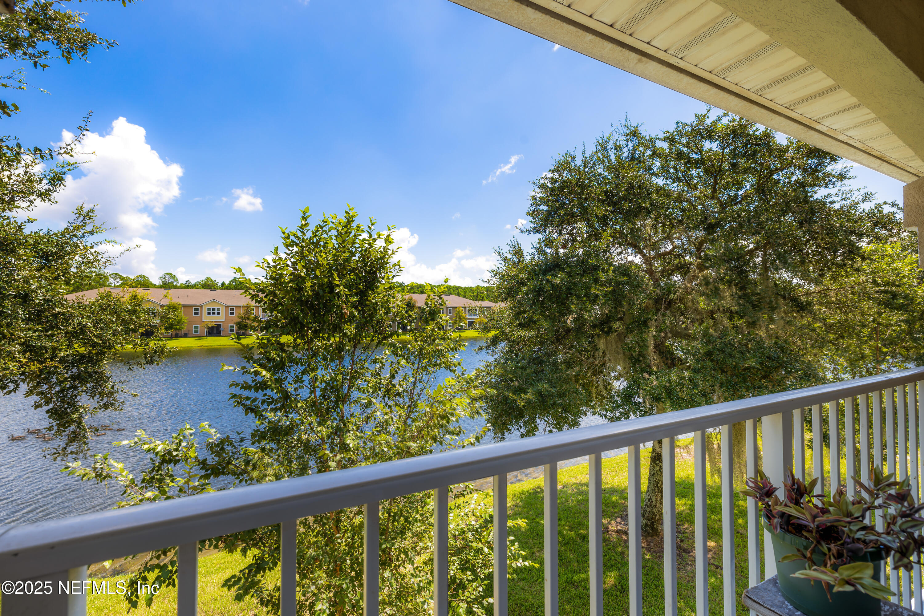 2784 Golden Lake Loop St. Augustine, FL 32084 - Photo 24 of 32 a view of a balcony with a tree