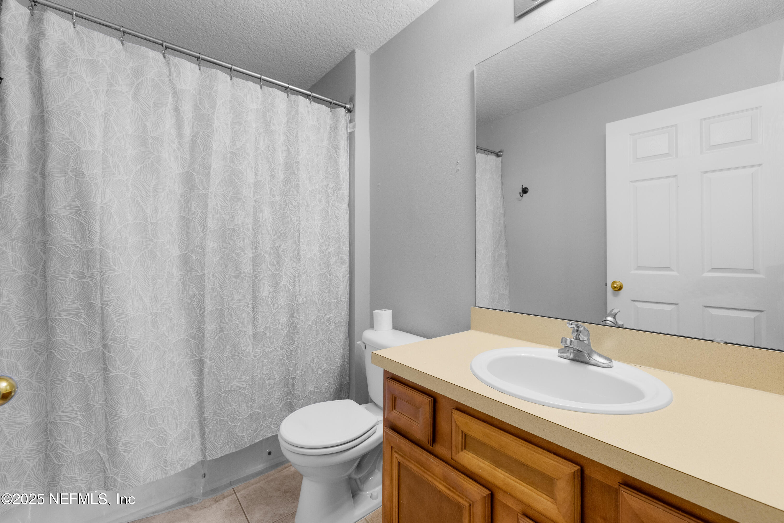 2784 Golden Lake Loop St. Augustine, FL 32084 - Photo 9 of 32 a bathroom with a sink and a toilet