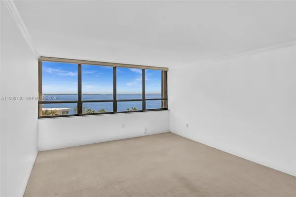 a bathroom with a tub a sink and a shower