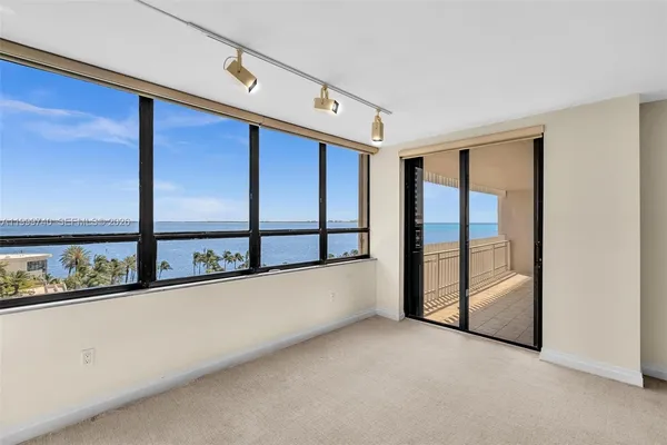 swimming pool view with a garden space