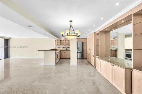 a kitchen with stainless steel appliances granite countertop a stove and a sink