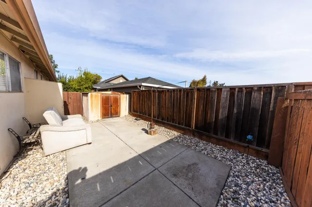a view of a back yard of the house