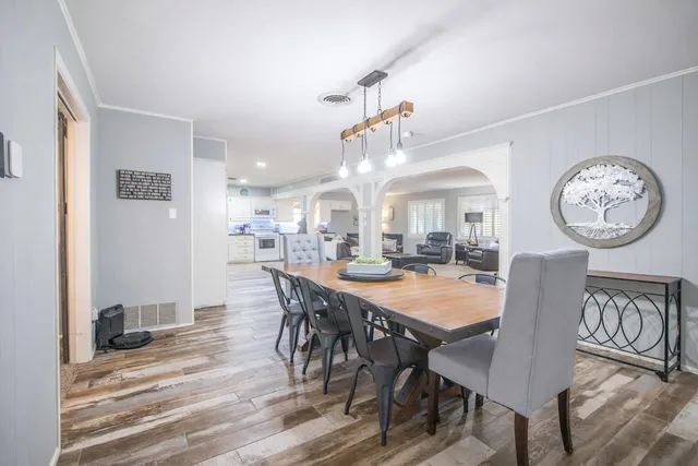 a bathroom with a toilet a sink and a mirror