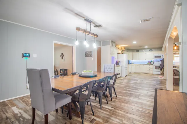 a bathroom with a sink and a refrigerator
