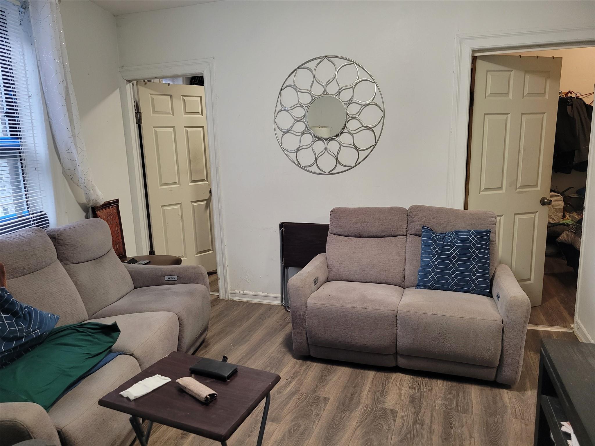 1046 Amsterdam Avenue, Unit 24 Manhattan, NY 10025 - Photo 2 of 8 Living room featuring wood-type flooring