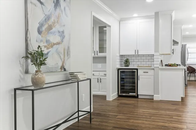 a kitchen with stainless steel appliances granite countertop a stove and a refrigerator