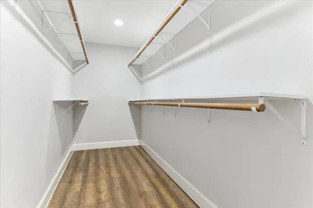 a view of a room with racks on the wall