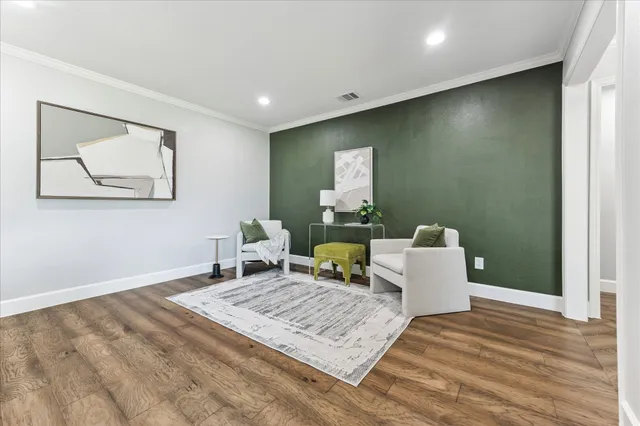 a living room with a rug