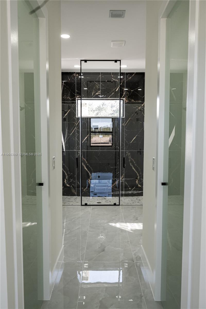 2903 East 17th Street Lehigh Acres, FL 33972 - Photo 13 of 34 a view of a storage & utility room