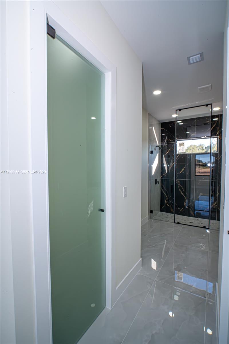 2903 East 17th Street Lehigh Acres, FL 33972 - Photo 30 of 34 a view of a room with gym equipment