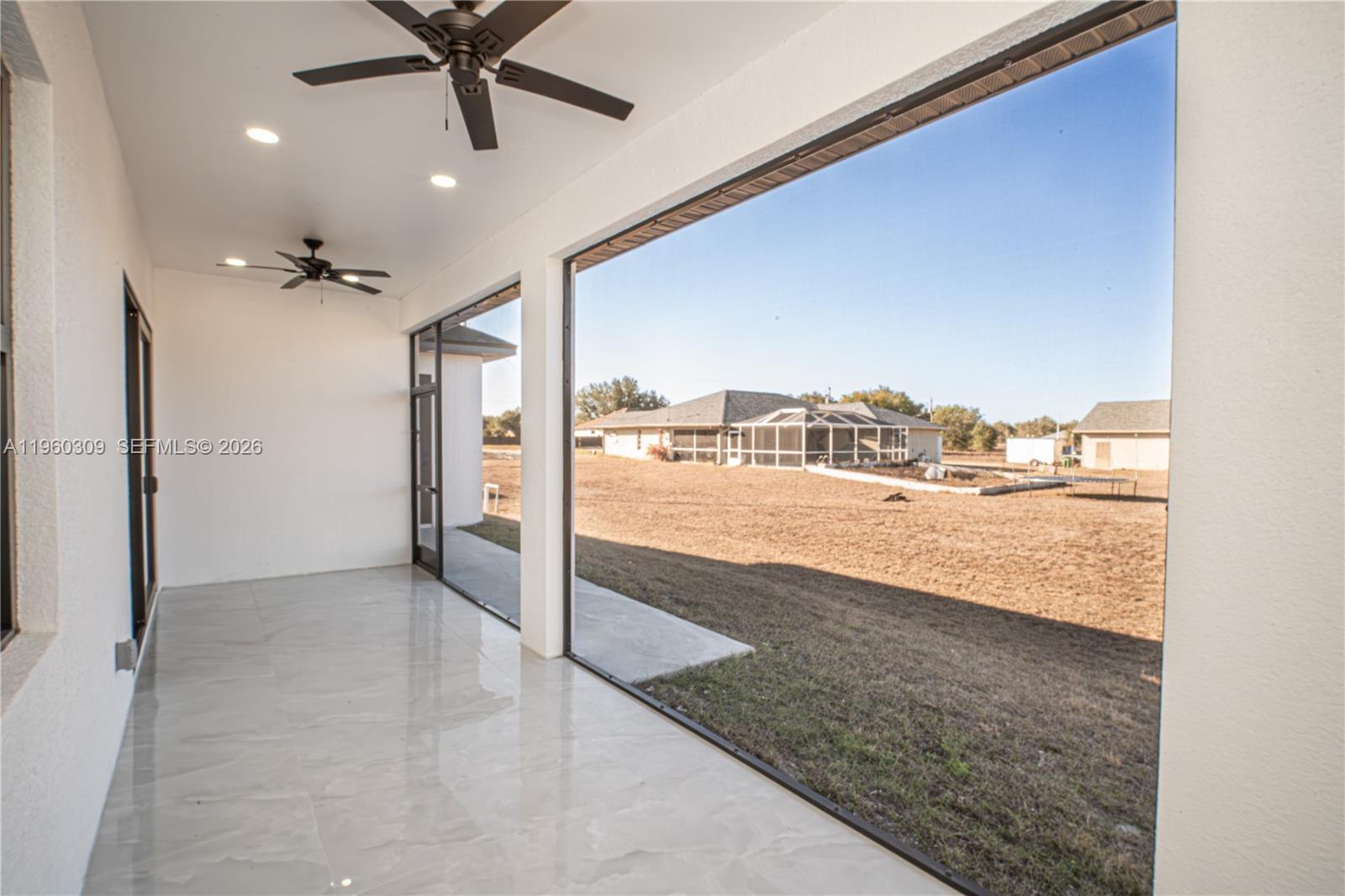 2903 East 17th Street Lehigh Acres, FL 33972 - Photo 31 of 34 a view of a living room