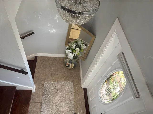 a vase of flowers sitting on a table